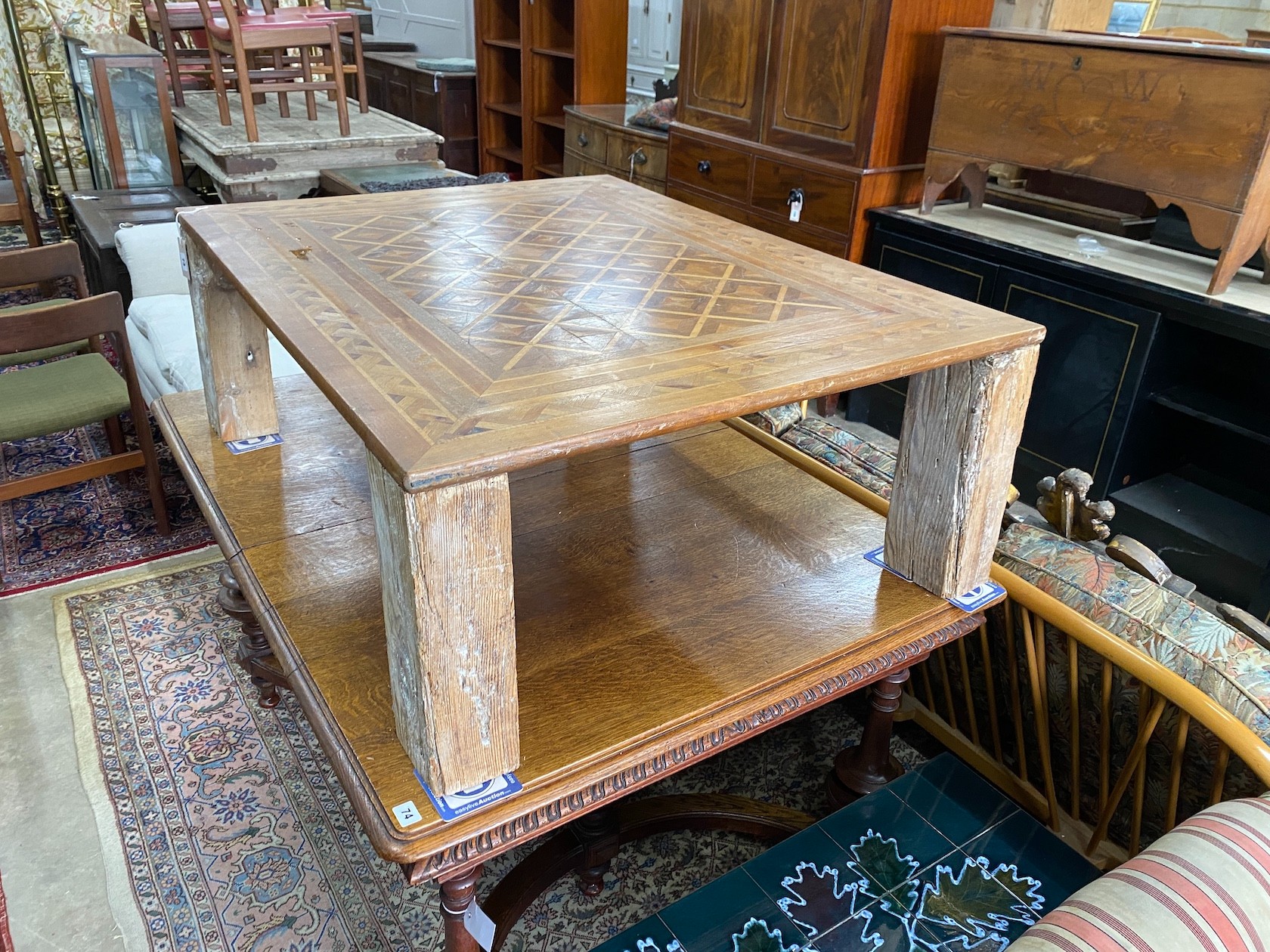 A rectangular parquetry coffee table, width 115cm, depth 89cm, height 40cm